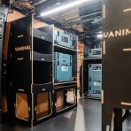 Rear van NS angle view of the Kia PV5 Cargo Makita Makpac Toolbox Compatible Van Racking (x3 V1) displayed with Makita toolboxes 