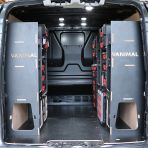 Rear van view of the Kia PV5 Cargo Milwaukee Packout Toolbox Compatible Van Racking (x3 V2) displayed with Milwaukee toolboxes