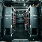 Rear van view of the Toyota Proace 2016+ L1 Milwaukee Packout Trolley Compatible Van Racking displayed with Milwaukee tools and trolley