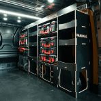 Rear van OS angle view of the Toyota Proace 2016+ L1 Milwaukee Packout Trolley Compatible Van Racking with optional top trays