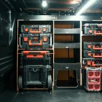 Side van view of the OS side of the Toyota Proace 2016+ L1 Milwaukee Packout Trolley Compatible Van Racking displayed with Milwaukee toolboxes and trolley