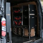 Rear van OS angle view of the Kia PV5 Cargo Milwaukee Packout Toolbox Compatible Van Racking (x3 V1) displayed with Milwaukee toolboxes