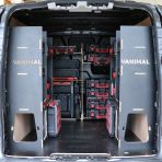 Rear van view of the Kia PV5 Cargo Milwaukee Packout Trolley Compatible Van Racking (x3 V1) displayed with Milwaukee toolboxes and trolley