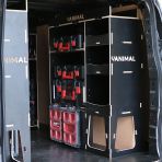 Rear van OS angle view of the Kia PV5 Cargo Milwaukee Packout Trolley Compatible Van Racking (x3 V1) displayed with Milwaukee toolboxes, trolley and top trays