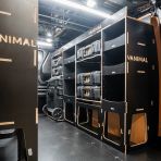 Rear van OS angle view of the Kia PV5 Cargo DeWalt ToughSystem Trolley Compatible Van Racking (x3 V2) displayed with DeWalt ToughSystem toolboxes, trolley and top trays