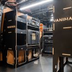 Rear van NS angle view of the Kia PV5 Cargo DeWalt ToughSystem Trolley Compatible Van Racking (x3 V1) displayed with DeWalt ToughSystem toolboxes and trolley