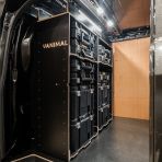 Side van view of the bulkhead section of the PV5 Cargo 2025- DeWalt TSTAK Toolbox Compatible Van Racking (x3 V1) displayed with DeWalt TSTAK toolboxes and top trays