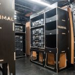 Rear van OS angle view of the Kia PV5 Cargo 2025- DeWalt TSTAK Trolley Compatible Van Racking (x3 V1) displayed with DeWalt TSTAK toolboxes and top trays