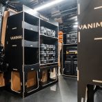 Rear van NS angle view of the Kia PV5 Cargo 2025- DeWalt TSTAK Trolley Compatible Van Racking (x3 V1) displayed with DeWalt TSTAK toolboxes and top trays