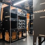 Rear van NS angle view of the Kia PV5 Cargo 2025- DeWalt TSTAK Trolley Compatible Van Racking (x3 V1) displayed with DeWalt TSTAK toolboxes