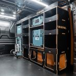 Rear van side angle view of the Citroen Dispatch 2016+ L2 Makita Makpac Trolley Compatible Van Racking (Full OS) displayed with Makita Makpac toolboxes