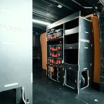 Rear van OS side angle view of the Peugeot Expert 2016+ LWB Hexaboard Milwaukee PackOut Double Rear Racking - displayed with Milwaukee toolboxes