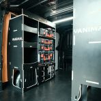 Rear van OS side angle view of the Peugeot Expert 2016+ LWB Hexaboard Milwaukee PackOut Double Rear Racking - displayed with Milwaukee toolboxes