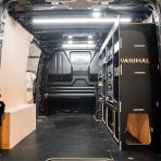 Side van view of the Fiat Scudo 2022+ L2 DeWalt TSTAK Trolley Compatible Van Racking (Full OS) displayed with DeWalt TSTAK toolboxes