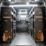 Rear van view of the Peugeot Expert 2016+ L2 DeWalt TSTAK Trolley Compatible Van Racking (x3 V2) displayed with DeWalt TSTAK toolboxes
