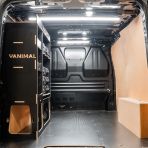 Rear van view of the Fiat Scudo 2022+ L2 DeWalt TSTAK Toolbox Compatible Van Racking - NS Rear displayed with DeWalt TSTAK toolboxes and top tray