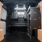 Rear van view of the Vauxhall Vivaro C 2019+ DeWalt TSTAK Toolbox Compatible Van Racking - Front displayed with DeWalt TSTAK toolboxes and top tray