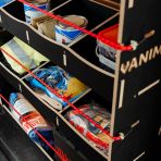 Close-up view of the racking compartments displaying equipment, tools and boxes 