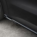 Close-up view of the rear section of the Ford Transit Custom 2023- Gloss Black Side Skirts