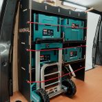Rear van side angle view of the Fiat Scudo SWB Hexaboard NS Rear MakPac/Toolbox Van Racking displayed with Makita toolboxes and trolley
