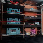 Nissan Townstar 2022 L2 driver side racking system with angled toolbox shelves and rear compartments
