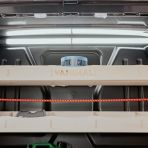 Close-up view of the Vanimal branding on the Transit Custom 2023- Full-Width Bulkhead Racking