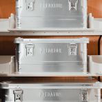 Close-up front view of the Transit Custom 2023- Front Predator Storage Box (x3) Ply Racking System