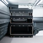 NS side van view of the Peugeot Partner L2 OS Front x4 Side Load Toolbox Shelves Hexaboard Van Racking - displayed with sliding door closed