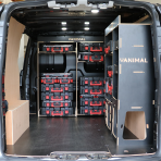 Rear van view of the Kia PV5 Cargo Milwaukee Packout Toolbox Compatible Van Racking (x2 V2) displayed with Milwaukee toolboxes and top trays