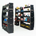 LH side angle view of the MAN TGE 2017- MWB Hexaboard Triple Van Racking with Toolbox Shelf displayed with tools and toolboxes