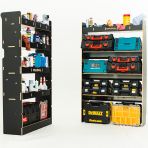 Side van view of the MAN TGE 2017- MWB Hexaboard Front Toolbox Shelving and Bulkhead Ply Racking displayed with tools and toolboxes