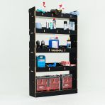 Close-up view of the bulkhead section of the MAN TGE 2017- MWB Hexaboard Front Toolbox Shelving and Bulkhead Ply Racking displayed with tools and toolboxes