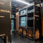 Rear van OS angle view of the Kia PV5 Cargo Makita Makpac Trolley Compatible Van Racking (x3 V1) displayed with Milwaukee toolboxes, trolley and top trays