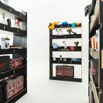 Close-up rear van view of the Citroen Relay 2006- SWB Hexaboard Double Rear and Bulkhead Racking displayed with tools and toolboxes