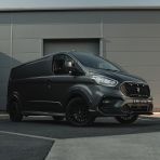 Front side angle view of the Magnetic Grey Transit Custom Predator Body Kit