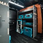 OS rear van view of the VW Transporter T7 Kombi LWB Double MakPac Hexaboard Van Racking displayed with tools and makita toolboxes