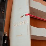 Side panel close-up view of the Vanimal branding and pre-notched bungee cords