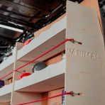 Side panel close-up view of the Vanimal branding and pre-notched for bungee cords