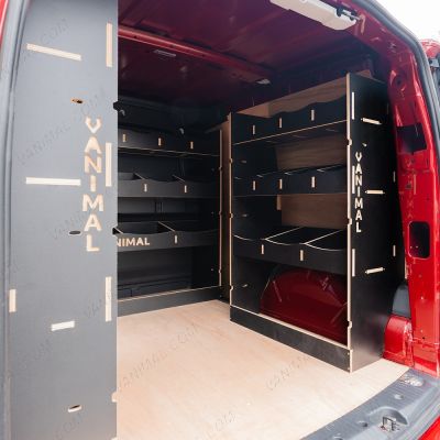 OS rear van side angle view of the Kia PV5 Cargo Double Rear and Bulkhead Hexaboard Van Racking