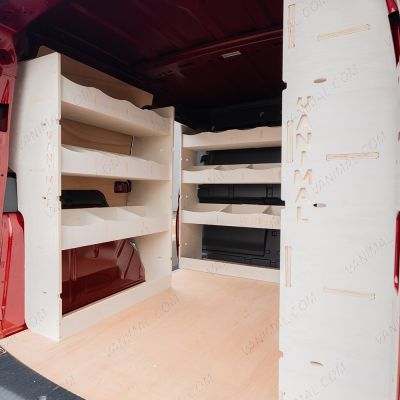 NS rear van side angle view of the Kia PV5 Cargo Double Rear and Bulkhead Van Racking