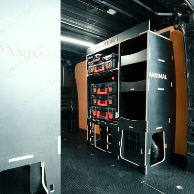 Rear van OS angle view of the Kia PV5 Cargo Milwaukee Packout Toolbox Compatible Van Racking (x2 Rears) displayed with top trays