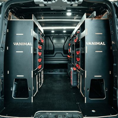 Rear van view of the Toyota Proace 2016+ L1 Milwaukee Packout Trolley Compatible Van Racking displayed with Milwaukee tools and trolley