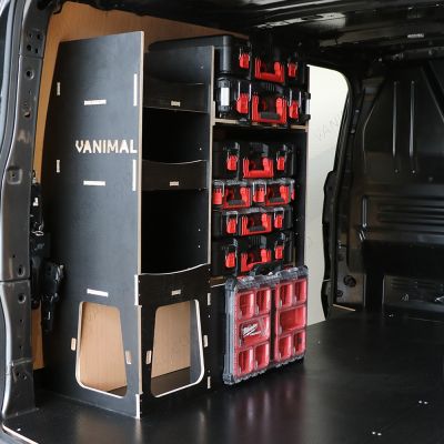 Rear van NS angle view of the Kia PV5 Cargo Milwaukee Packout Toolbox Compatible Van Racking - NS Rear displayed with Milwaukee toolboxes