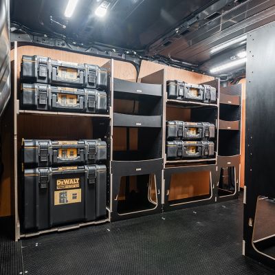 Side van view of the Kia PV5 Cargo DeWalt ToughSystem Toolbox Compatible Van Racking (x3 V2) displayed with DeWalt ToughSystem toolboxes