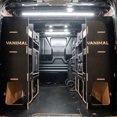 Rear van view of the Kia PV5 Cargo DeWalt ToughSystem Trolley Compatible Van Racking (x3 V2) displayed with DeWalt ToughSystem toolboxes and trolley