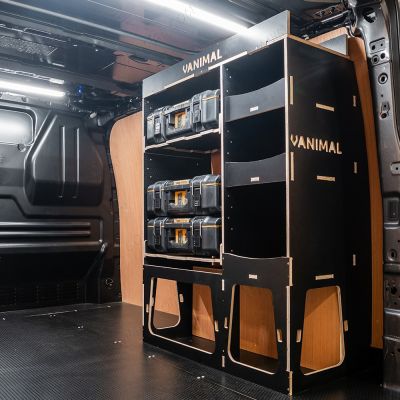 Rear van side angle view of the Kia PV5 Cargo DeWalt ToughSystem Toolbox Compatible Van Racking - OS Rear displayed with DeWalt ToughSystem toolboxes and top tray