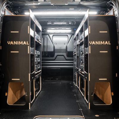 Rear van view of the Peugeot Expert 2016+ L1 DeWalt TSTAK Toolbox Compatible Van Racking (x3 V2) displayed with DeWalt TSTAK toolboxes and top trays