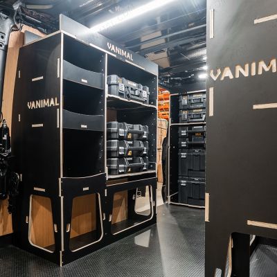 NS rear van view of the PV5 Cargo 2025- DeWalt TSTAK Toolbox Compatible Van Racking (x3 V1) displayed with DeWalt TSTAK toolboxes and top trays