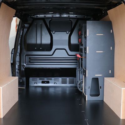 Rear van view of the Kia PV5 Cargo Milwaukee Packout Trolley Compatible Van Racking - Front displayed with Milwaukee toolboxes and trolley