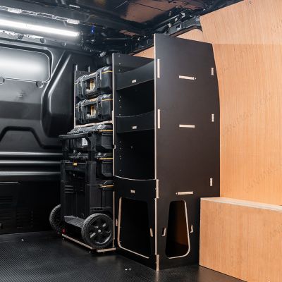 Rear van side angle view of the Kia PV5 Cargo DeWalt ToughSystem Trolley Compatible Van Racking - Front displayed with DeWalt ToughSystem toolboxes and trolley